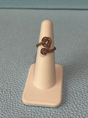 Touchstone Crystal by Swarovski curled up ring blush size 6